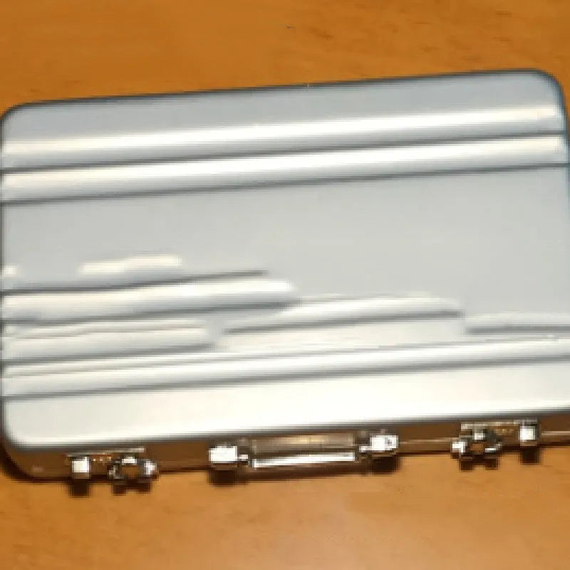 Slim aluminium metal card holder in six colours: red, blue, black, silver, pink, and gold.