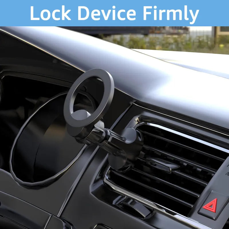 Black magnetic car phone holder clipped to a car air vent with a smartphone attached.