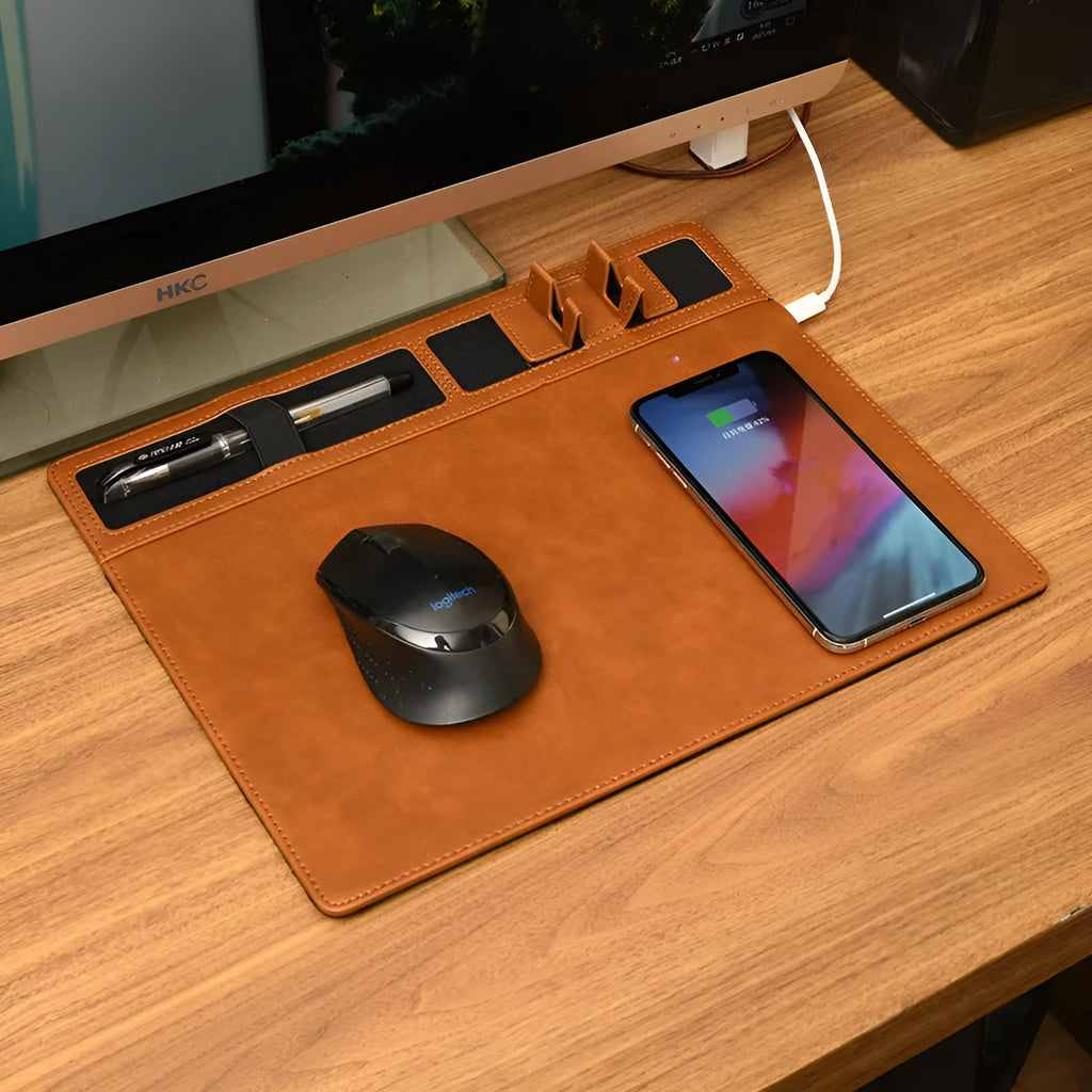 Wireless charging mouse pad with phone holder in four colour options on a desk