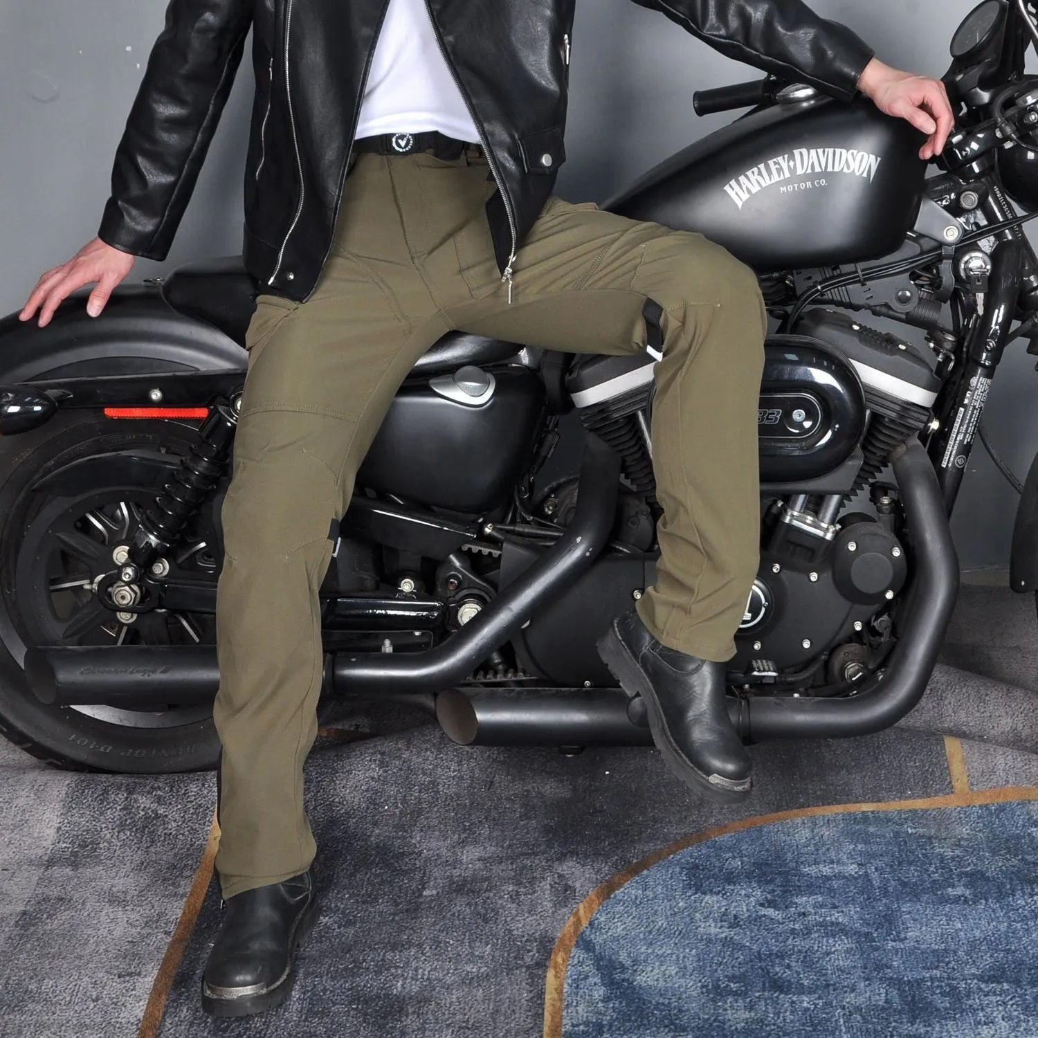 Motorcycle waterproof cycling trousers in black or green with included belt and protective gear