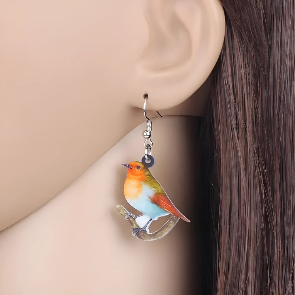 A pair of geometric acrylic earrings with a printed Blue Titmouse bird design in two colour options.