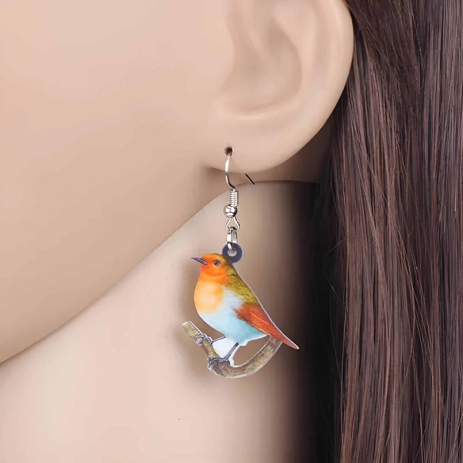 A pair of geometric acrylic earrings with a printed Blue Titmouse bird design in two colour options.