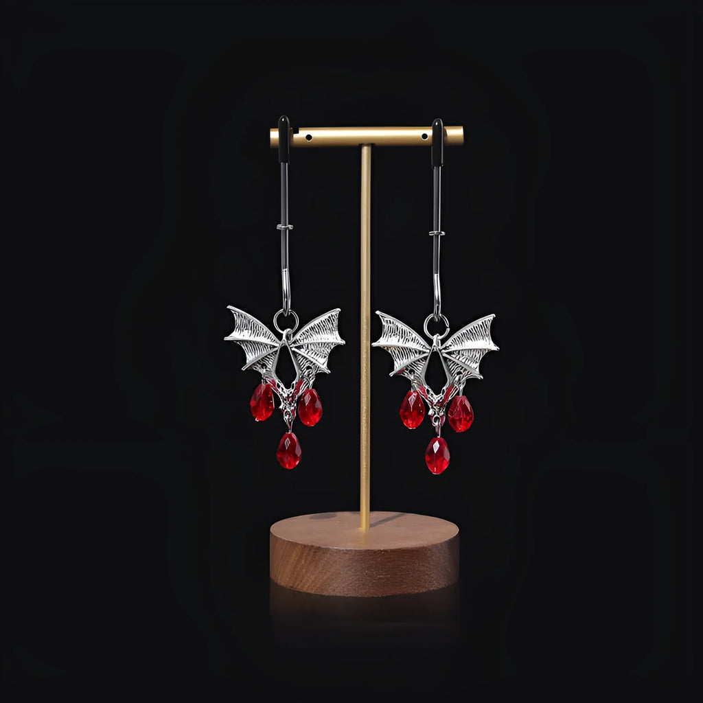 Silver alloy adjustable bat nipple clamp with screw mechanism on white background