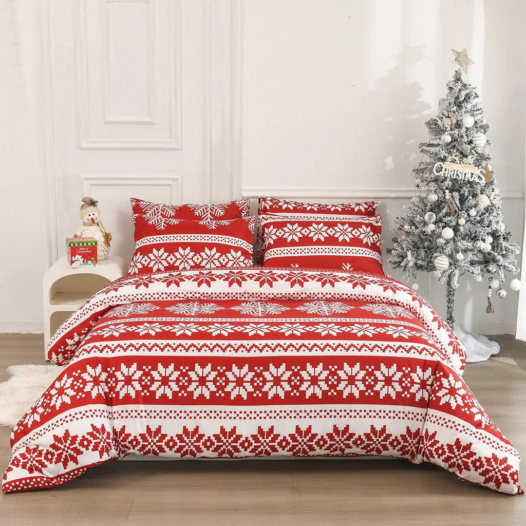 Winter Sleepers pattern three-piece bedding set in red on a bed