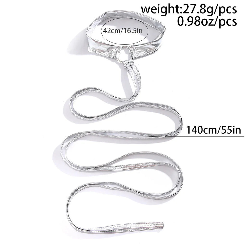 Silver cross thigh chain anklet with adjustable lace-up design on ankle