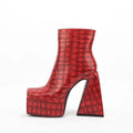 Women's ankle boot with a high heel, shown in a solid colour, made from artificial PU leather.