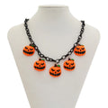 Halloween necklace with acrylic ghost and pumpkin pendant in mixed colours on regular chain