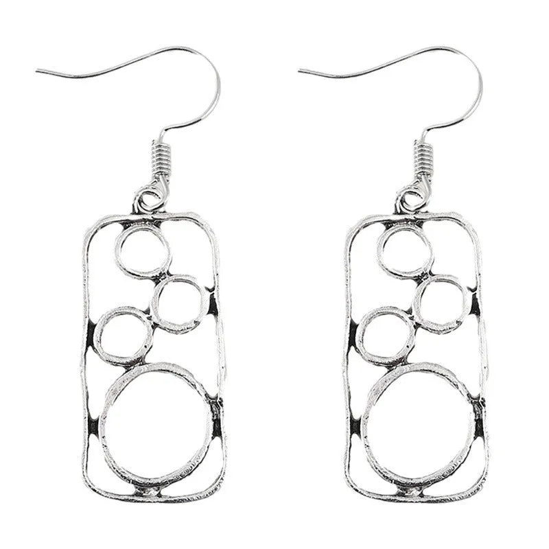 Round geometric earrings with irregular square designs in antique silver finish