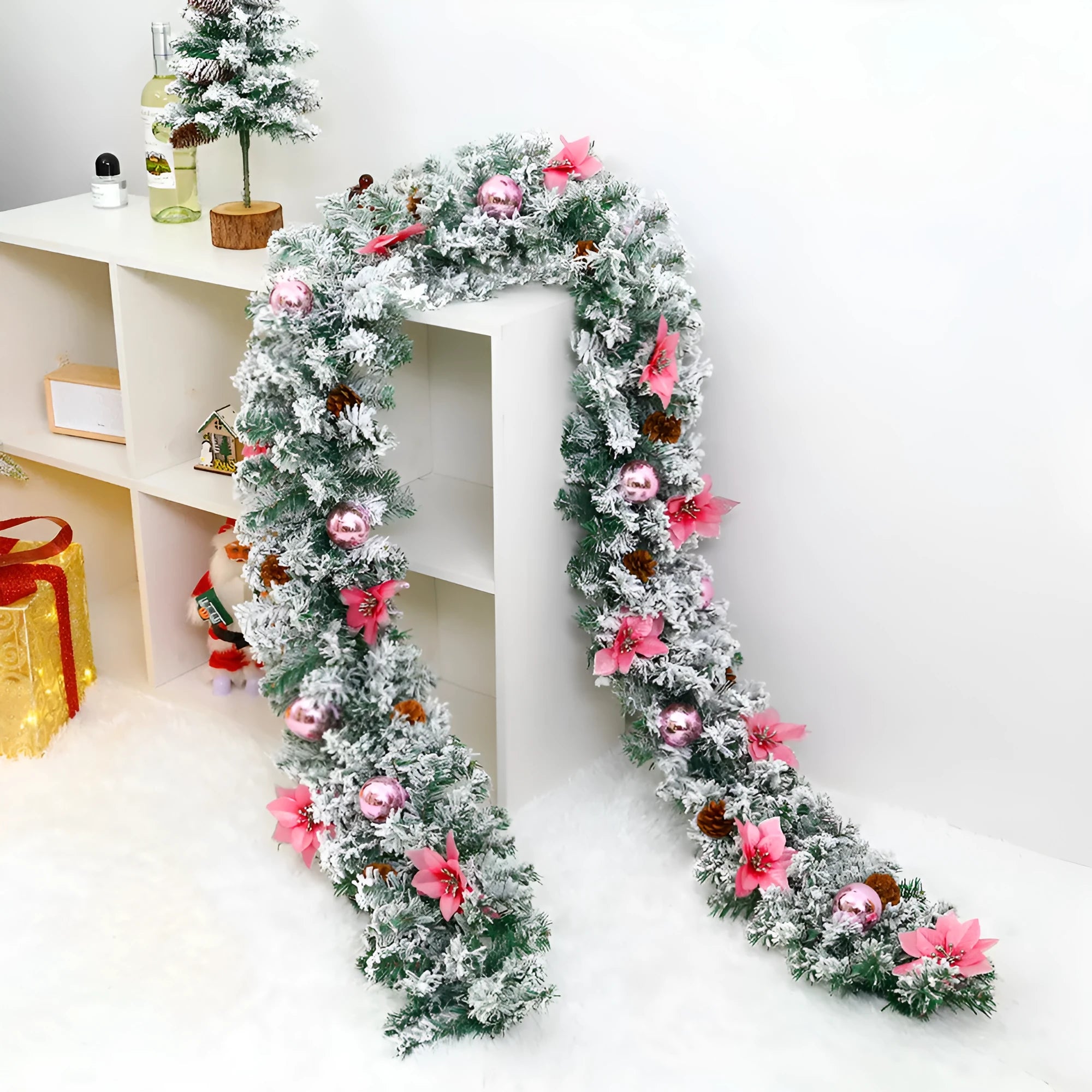 Flocked PVC Christmas rattan garland with 240 colourful heads draped over a mantelpiece