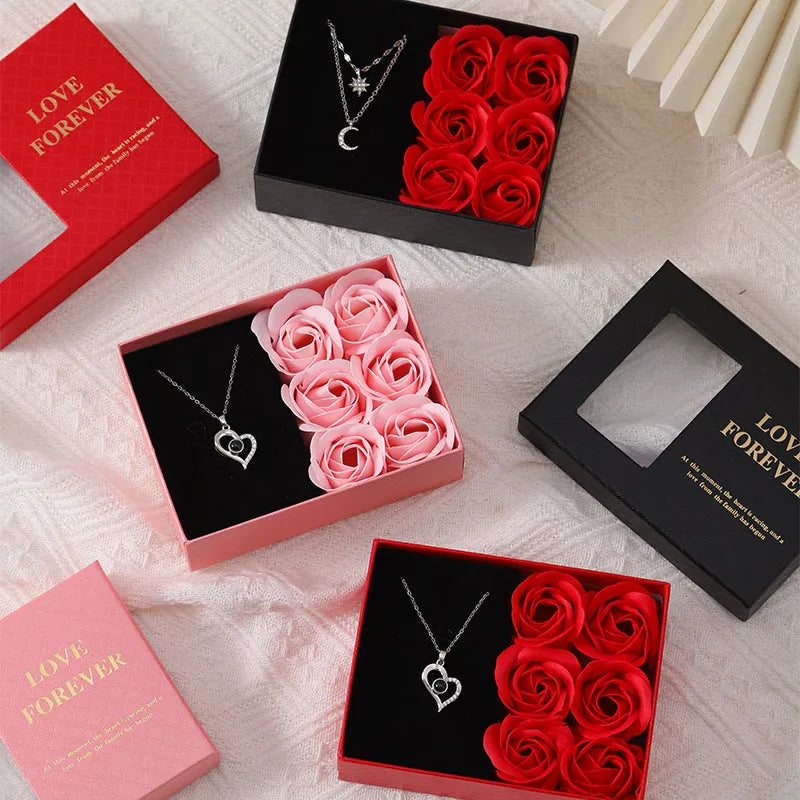 Korean style gift box containing six red soap roses with a matching handbag.