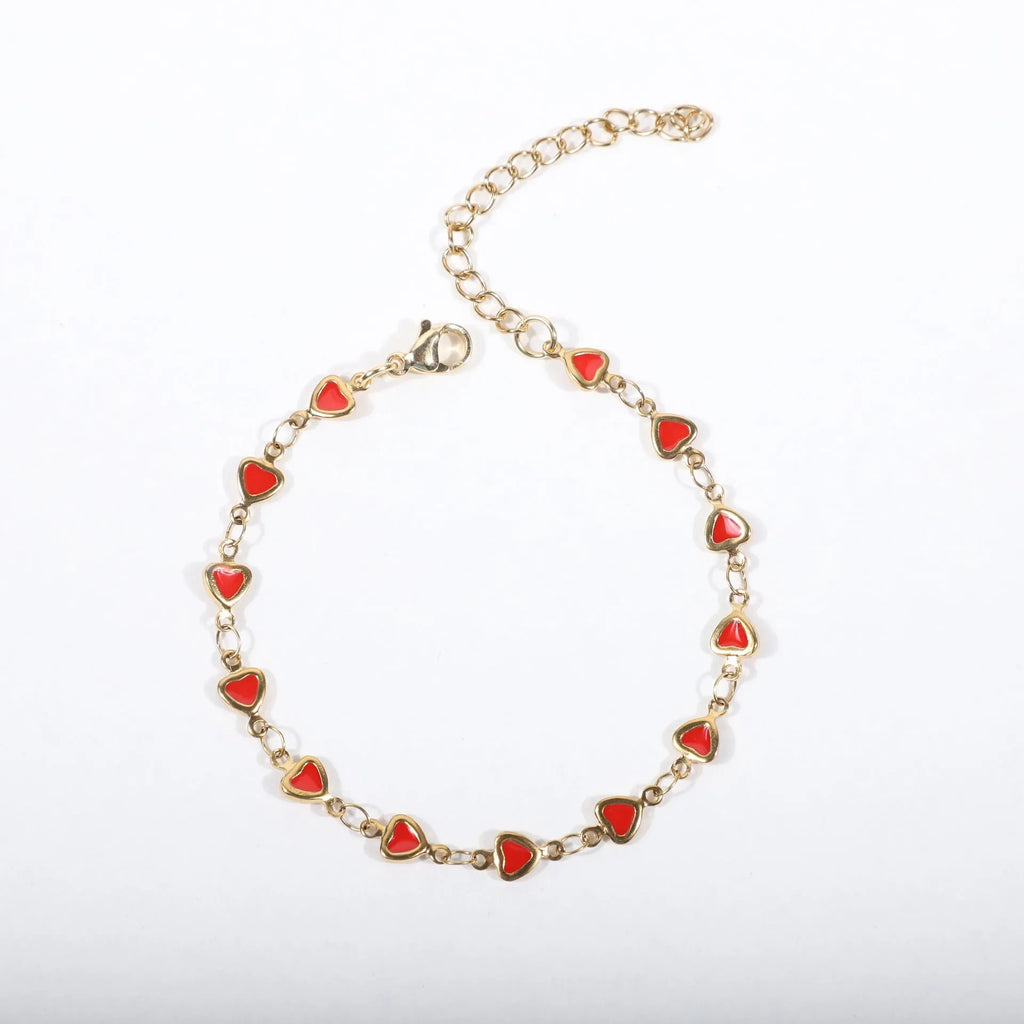 Stainless steel heart bracelet with 18K gold vacuum plating in choice of colours on a 17+5cm chain.