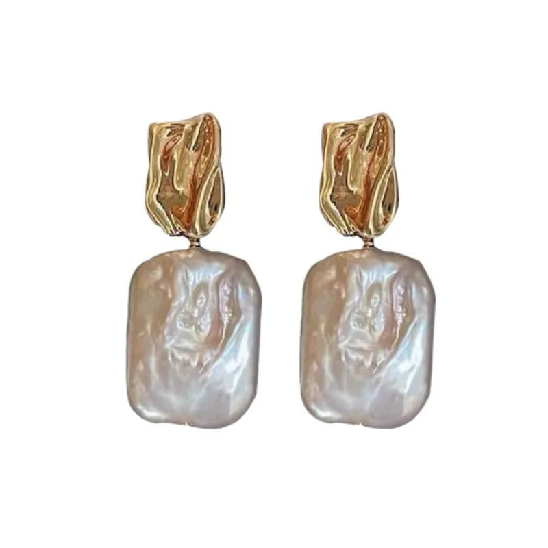 Natural freshwater pearl square stud earrings with geometric retro design in purple colour on alloy base.