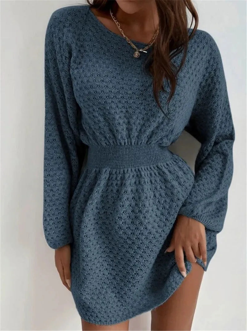 Blue women's knitted dress with hand-crocheted flower details and fitted waist