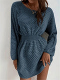 Blue women's knitted dress with hand-crocheted flower details and fitted waist