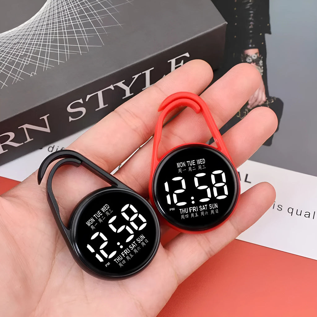 LED digital watch with luminous display and plastic strap in one of ten colour options on a wrist.