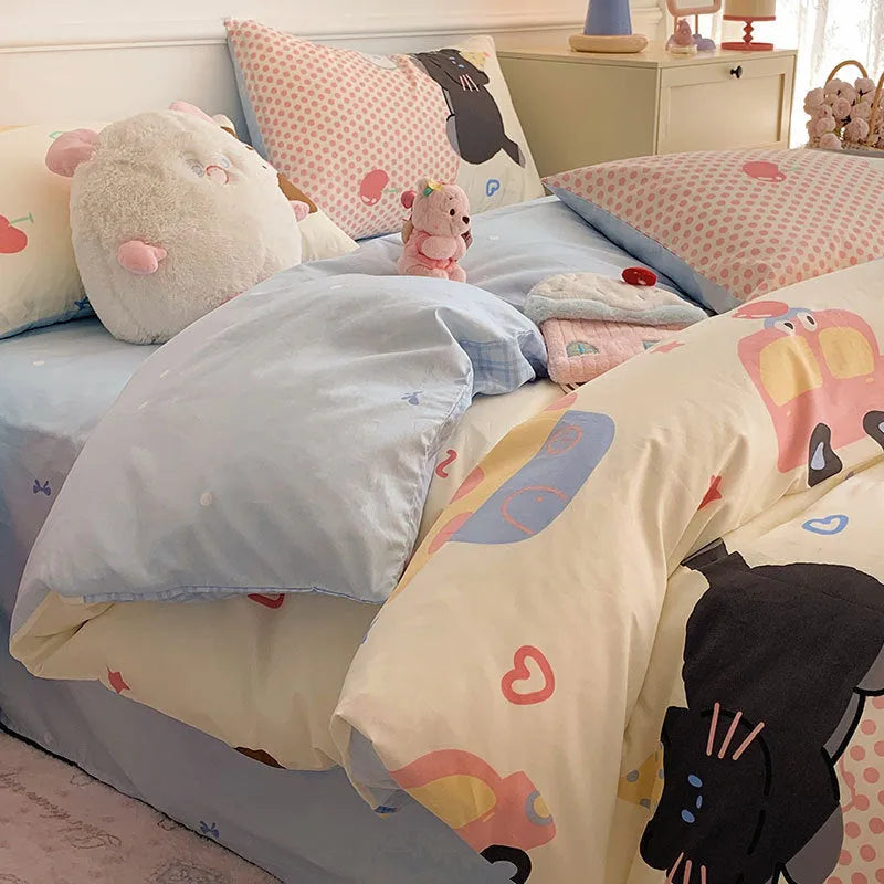 Cartoon dog pattern pure cotton duvet cover and pillowcase set on a bed.