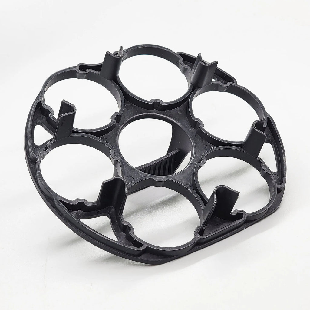Black plastic egg holder rack with individual compartments measuring 13.8cm wide
