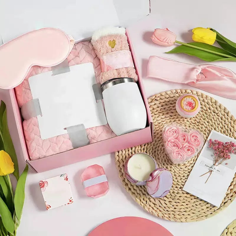 Boxed aromatherapy candle gift set with various modern soy wax designs including pink and sunflower themes.