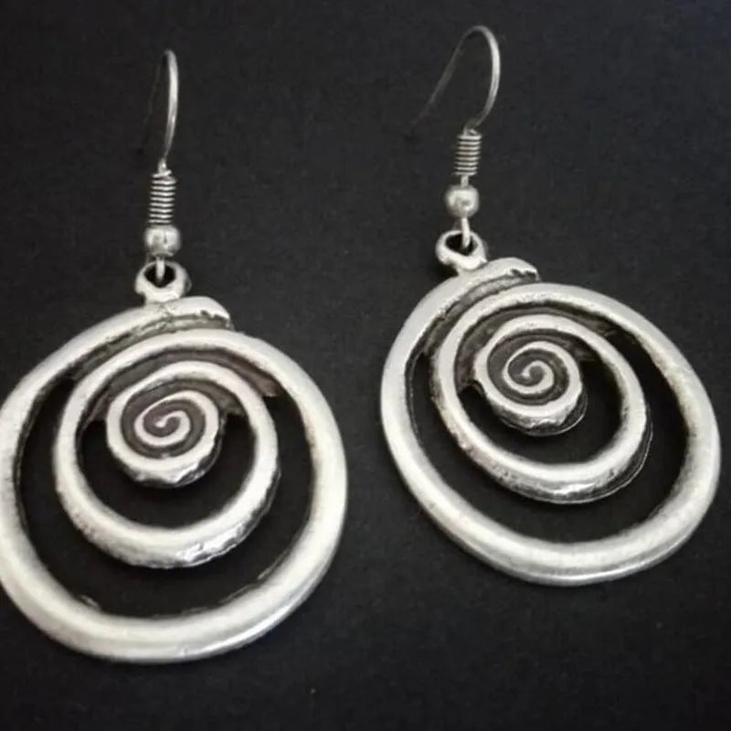 Silver geometric spiral distressed earrings with retro national style design measuring 2.6*5cm