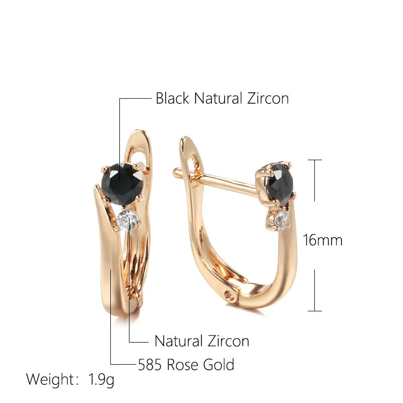 Gold drop-shaped women's earrings with a black agate stone inlay and retro geometric design.