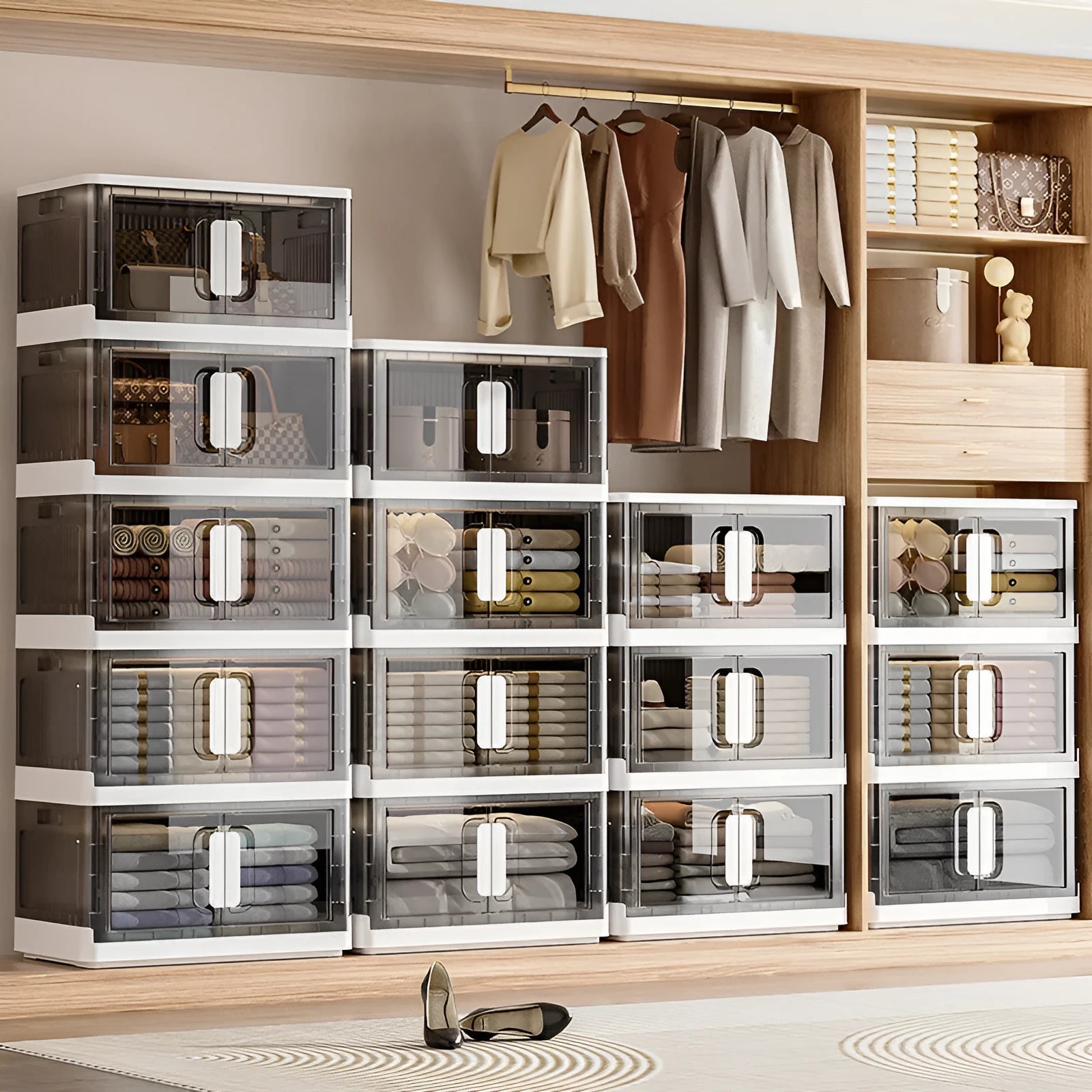 Foldable white storage locker with wheels showing multiple tiers for household organisation