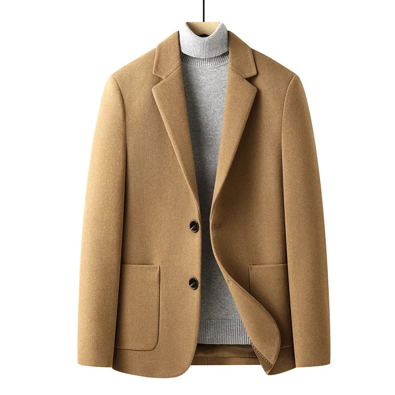 Men's slim fit wool suit jacket in a grey colour, showing the tailored silhouette and front button closure.