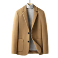 Men's slim fit wool suit jacket in a grey colour, showing the tailored silhouette and front button closure.