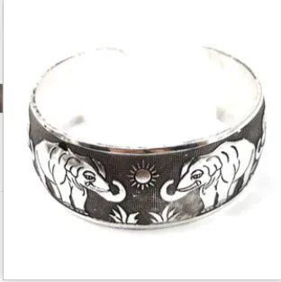 Carved openwork Miao silver style bracelet with Roman shape in alloy material