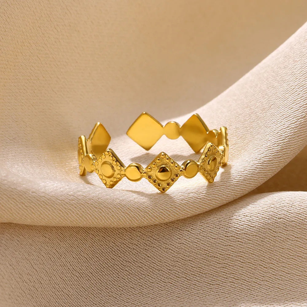 Gold diamond geometric titanium steel women's ring showing geometric design details