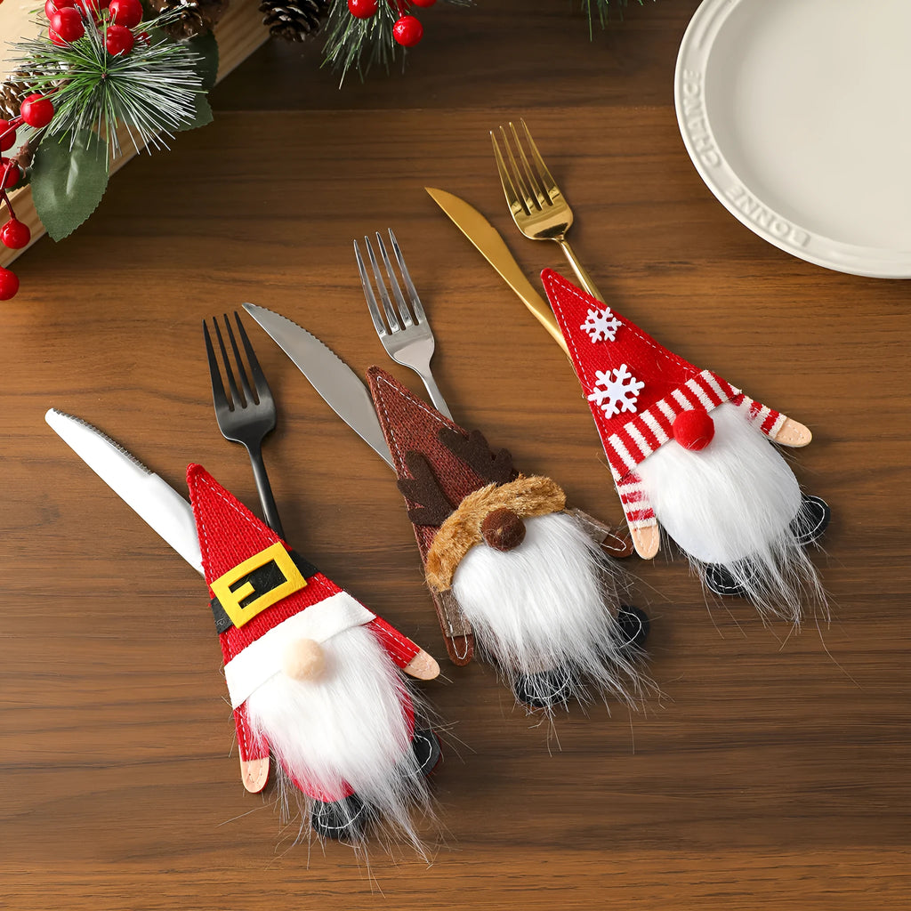 Christmas knife and fork cloth cover in snowflake style on a dining table