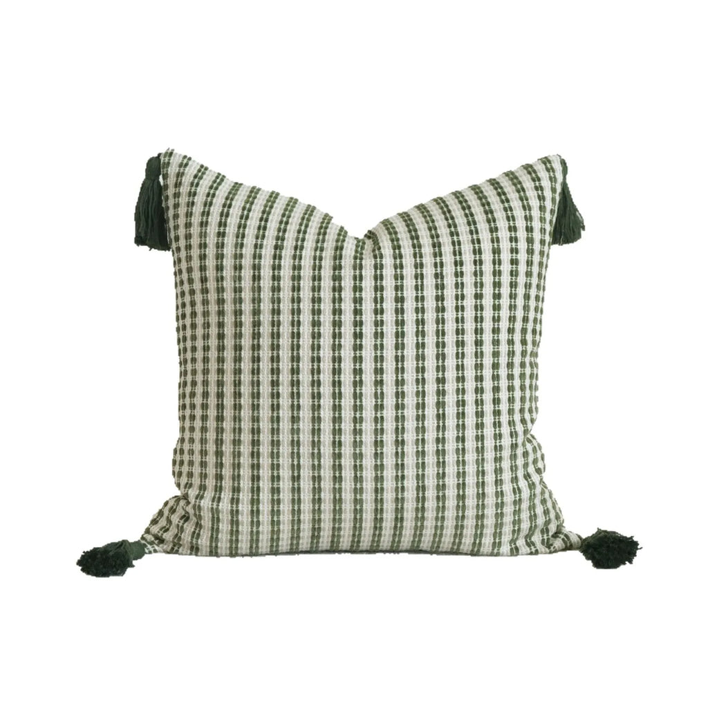 Green striped cotton linen hotel sample pillow with silk floss filler on a bed display.