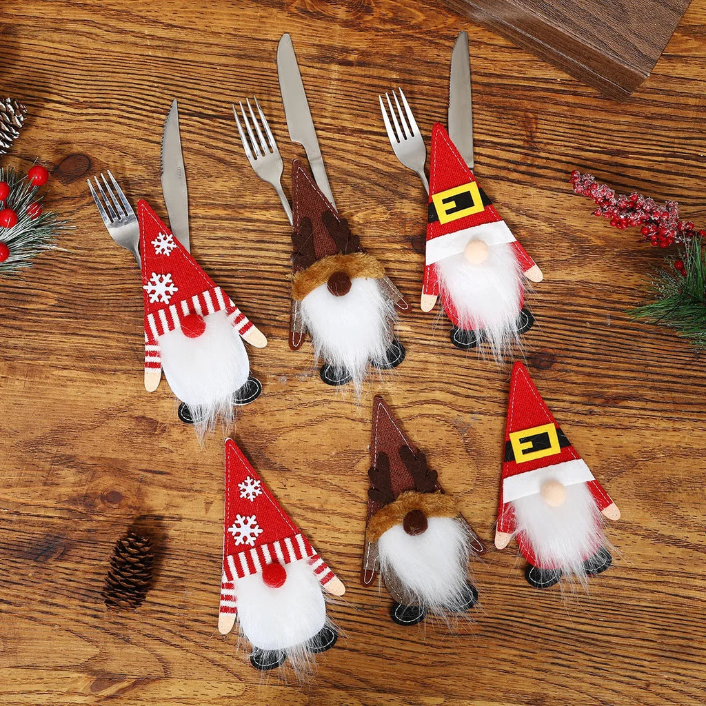 Christmas knife and fork cloth cover in snowflake style on a dining table