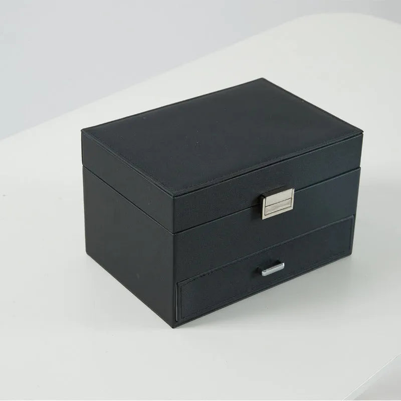 Hard case PU leather jewellery storage box in rose gold colour with dimensions 22.5cm by 15.5cm.