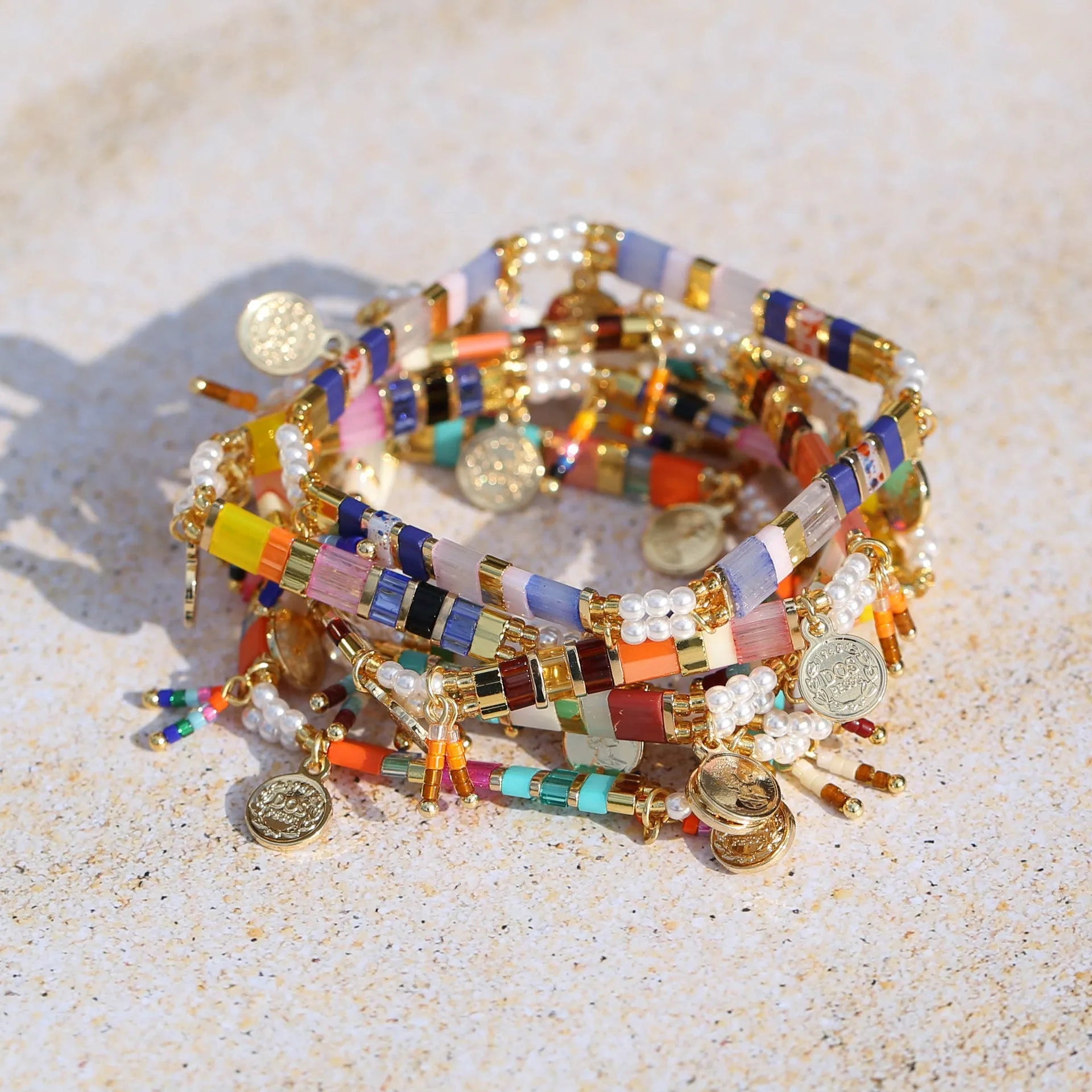 Women's imitation pearl beaded bracelet with glass coloured detailing in pearl lift colour options
