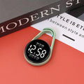 LED digital watch with luminous display and plastic strap in one of ten colour options on a wrist.