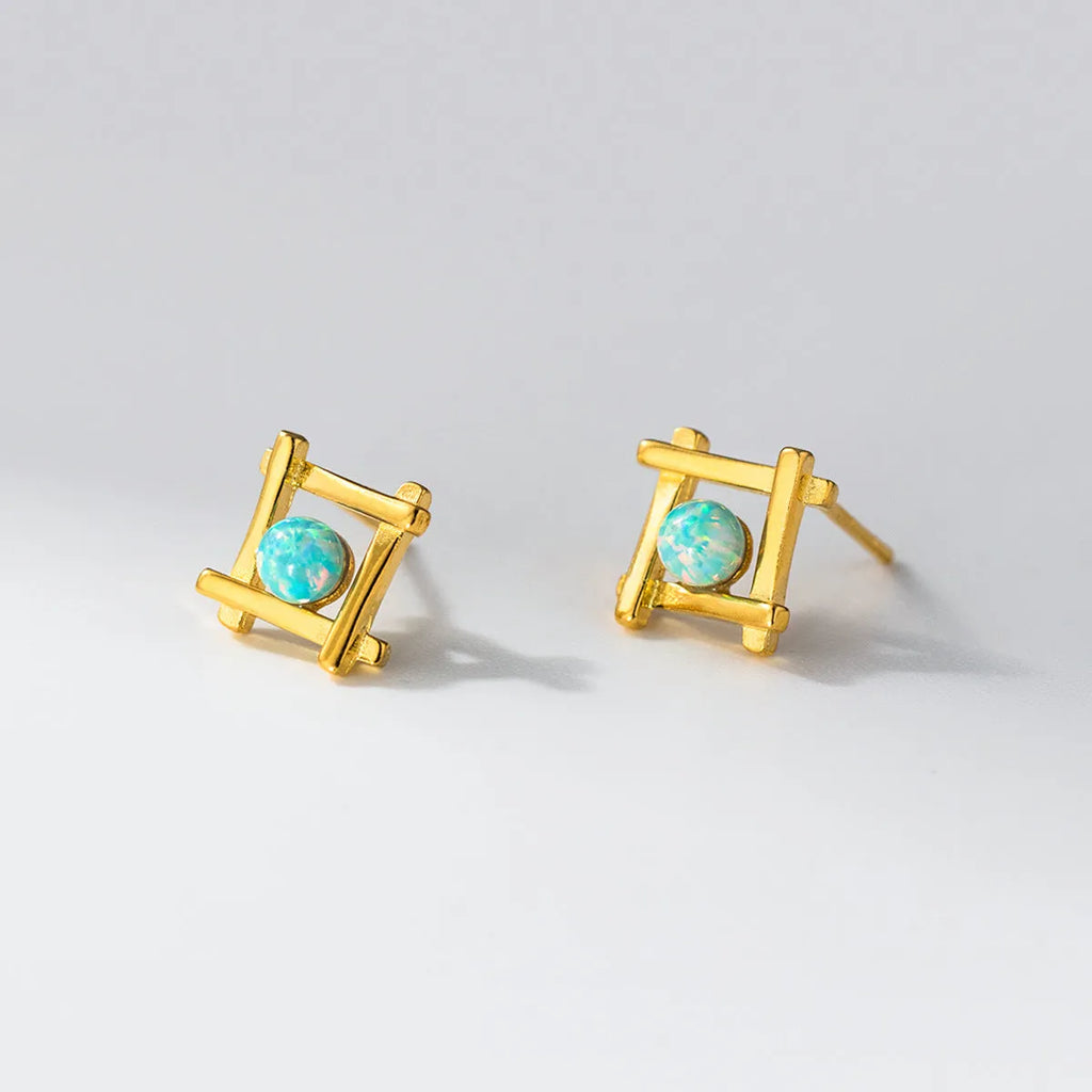 Geometric cross quadrangle stud earrings in 925 silver with Seiko treatment, silver and gold colour options