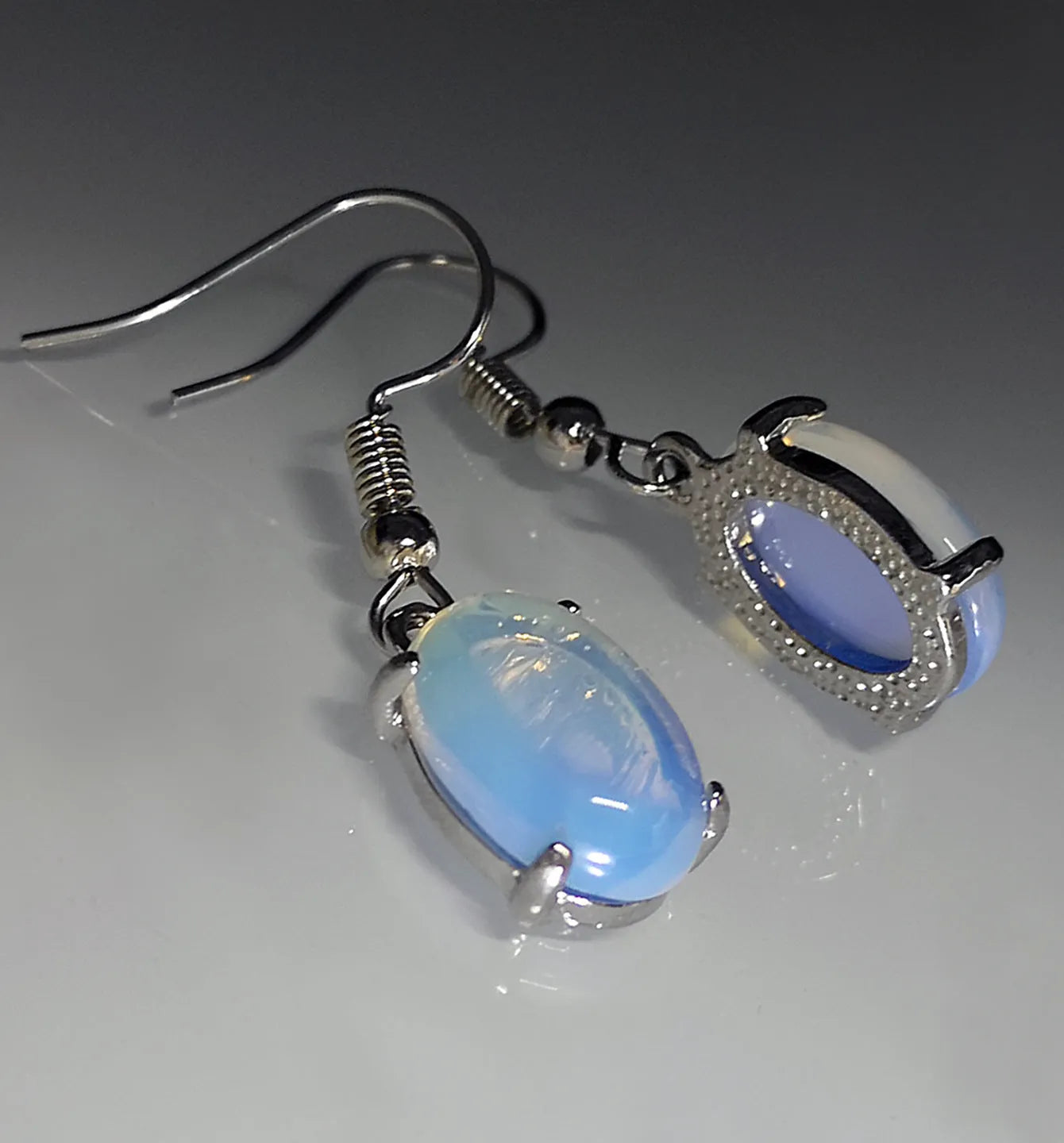 Moonlight white opal drop earrings with retro moonstone design and elliptical elements