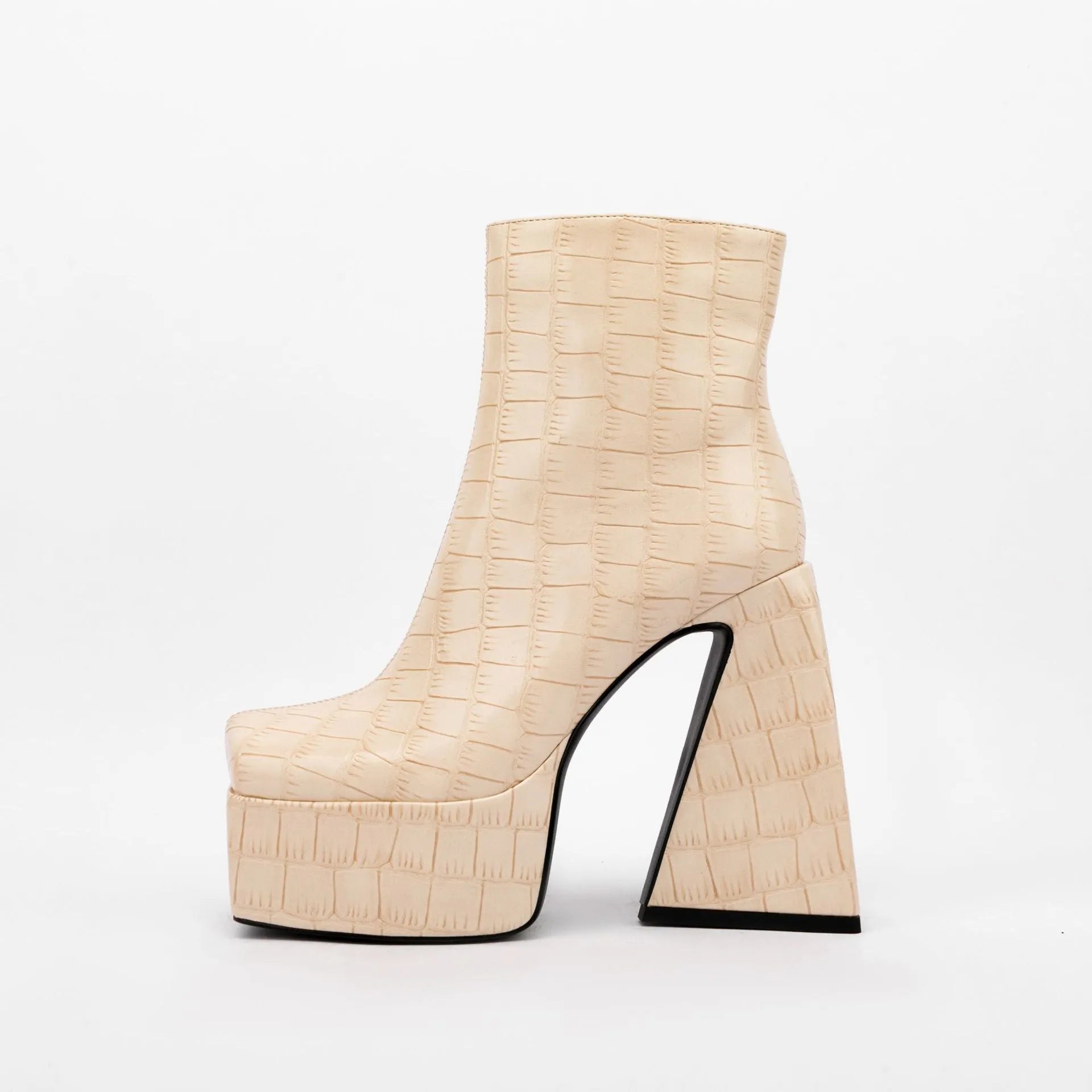 Women's ankle boot with a high heel, shown in a solid colour, made from artificial PU leather.