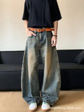 Men's retro blue distressed wide-leg jeans with a slimming fit through hips and thighs.