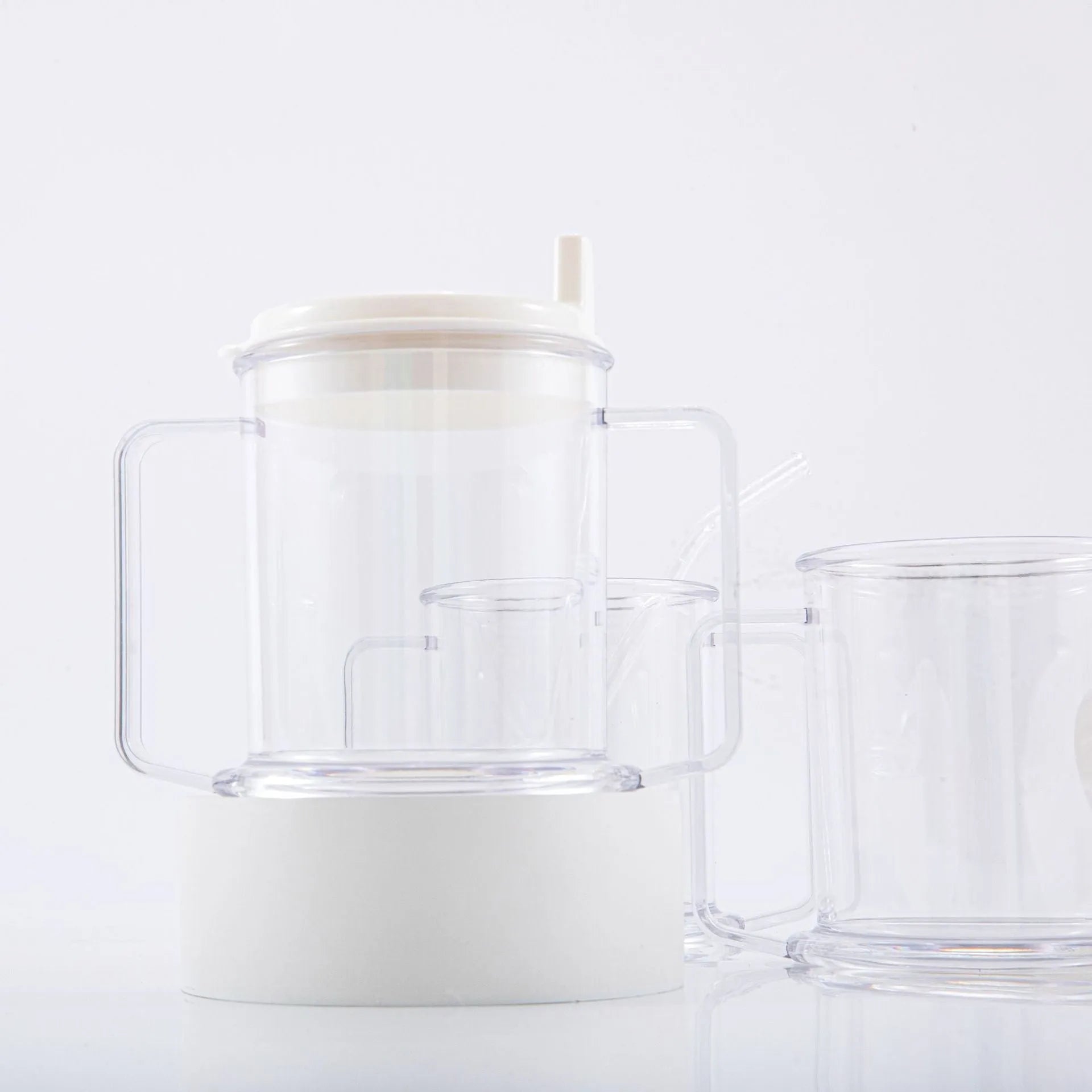 Transparent spill-proof drinking cup with modern design showing 14cm height