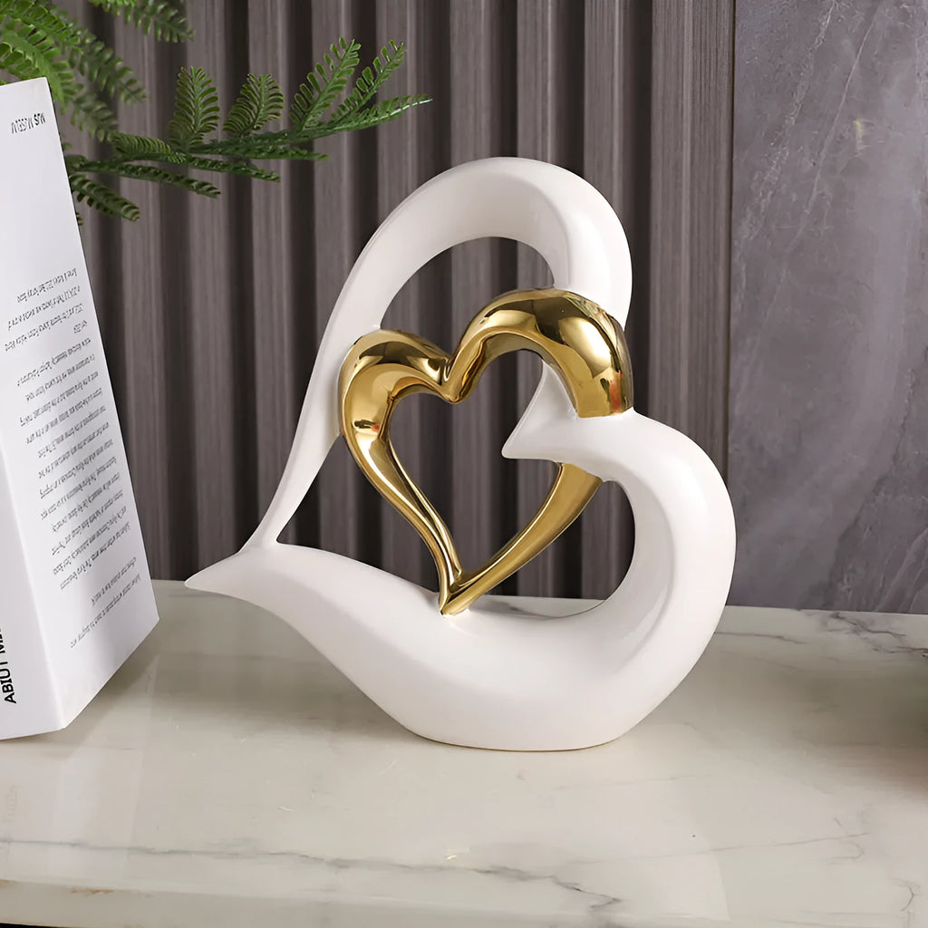 White porcelain love heart ornament in modern geometric style with 1939 Black Gold colour finish on shelf
