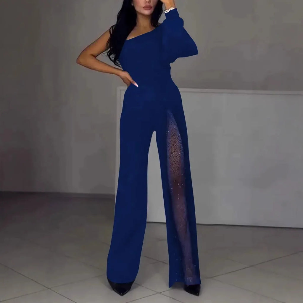 Black oblique shoulder high slit women's long sleeve jumpsuit on a model.