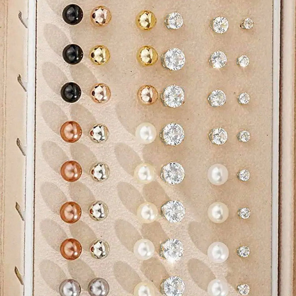 108 geometric round pearl earrings in gold and yellow electroplated alloy finishes displayed as a collection