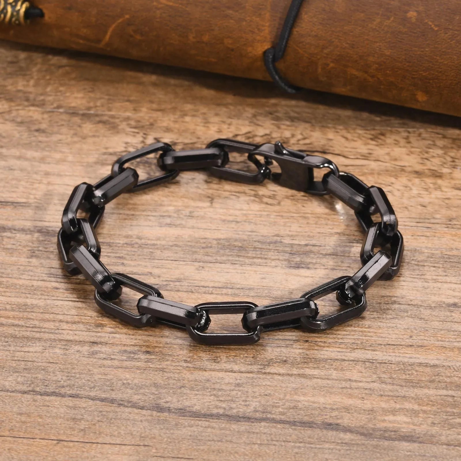 Men's simple square chain bracelet in titanium steel showing steel, gold, black, and retro colour options.
