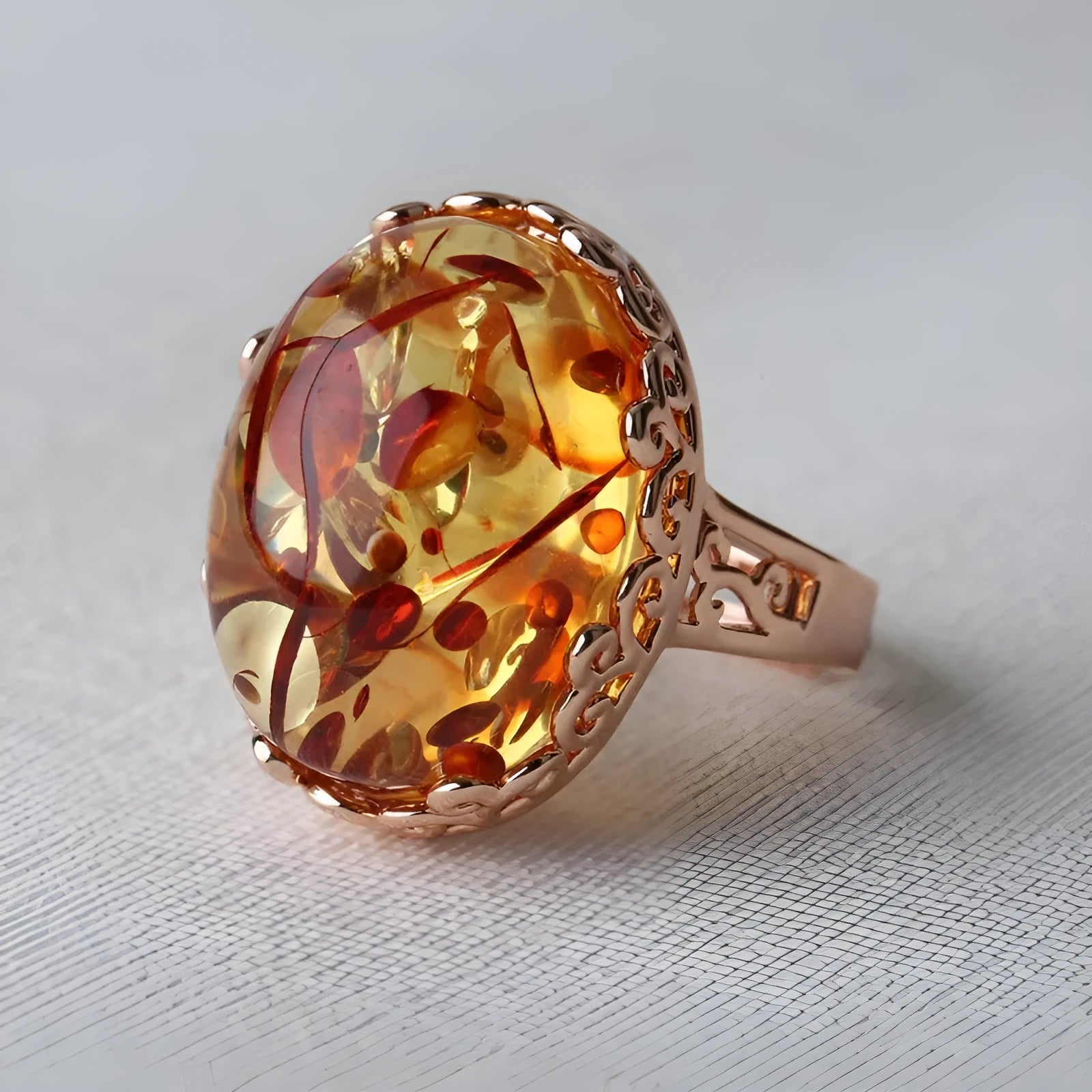 Amber beeswax ring with new amber type A colour and alloy band in ethnic retro style
