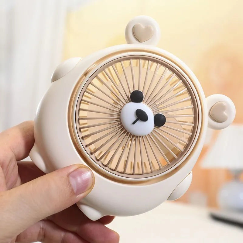 USB desktop fan with dog design showing three speed settings and lightweight plastic construction