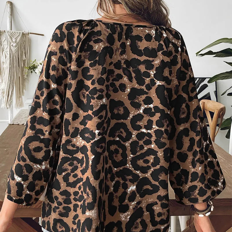 Women's leopard print polyester V-neck pullover top with half sleeves in multicolour