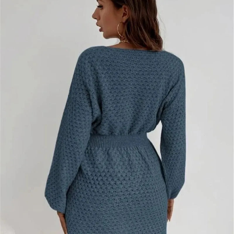 Blue women's knitted dress with hand-crocheted flower details and fitted waist