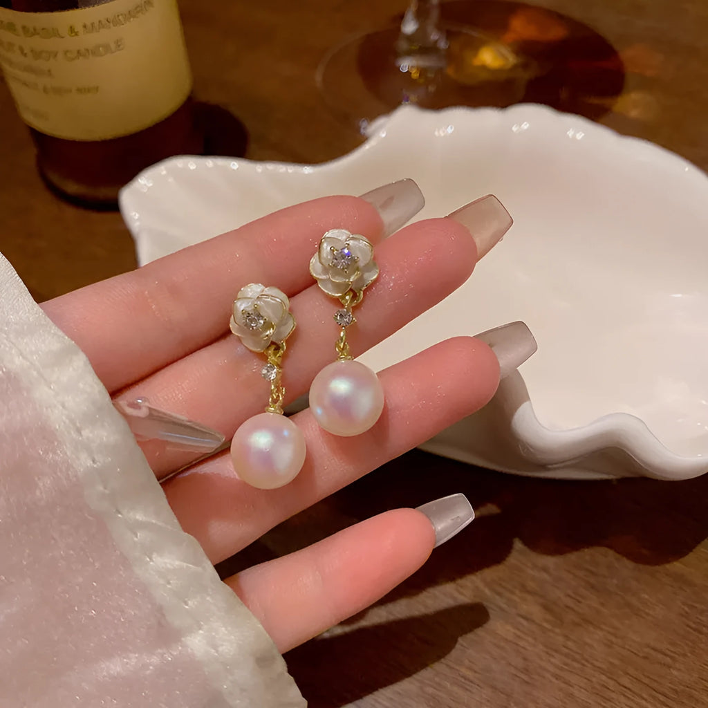 Camellia flower stud earrings with pearl detail in alloy metal for women