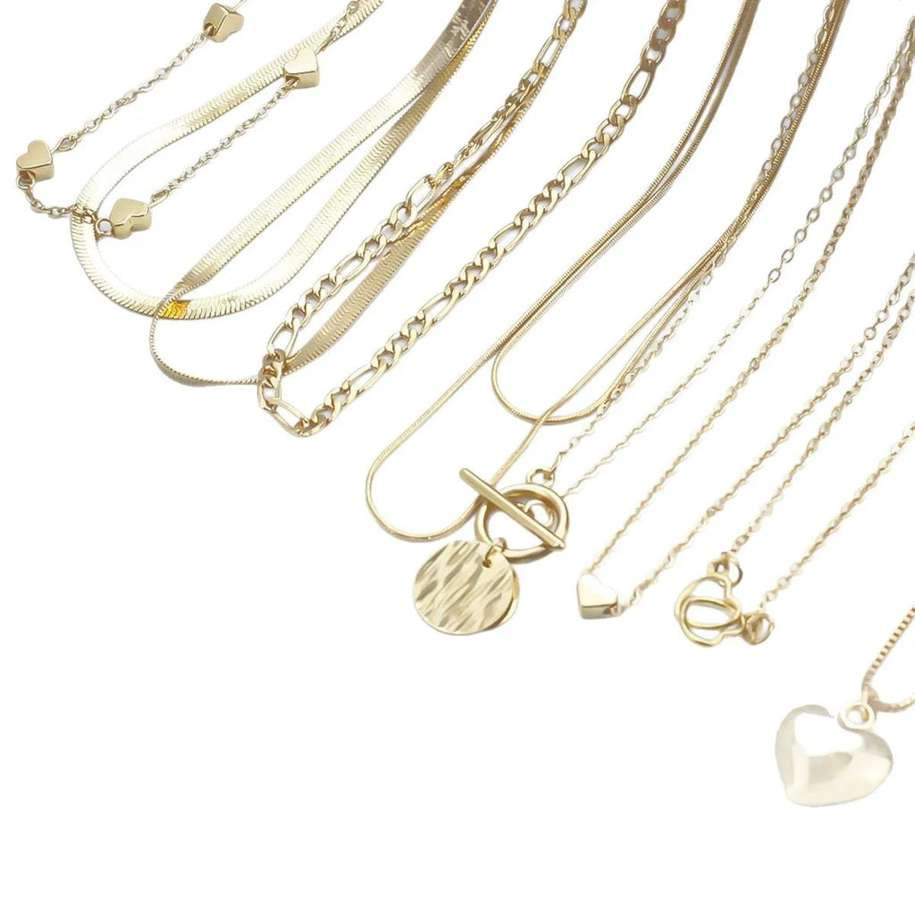 Ten gold electroplated necklaces with alloy pendants on adjustable snake bone chains